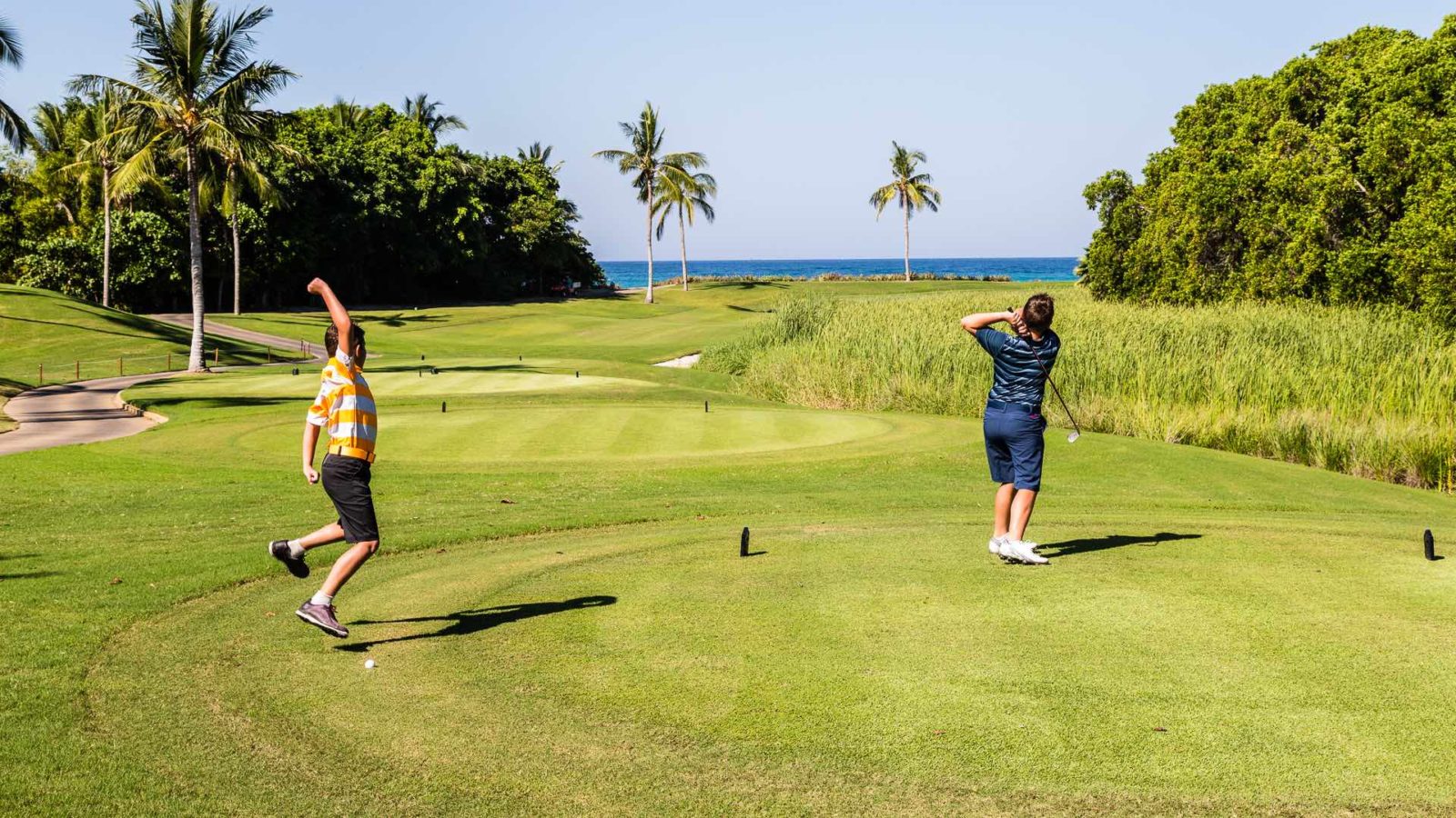 Boys Playing Golf
